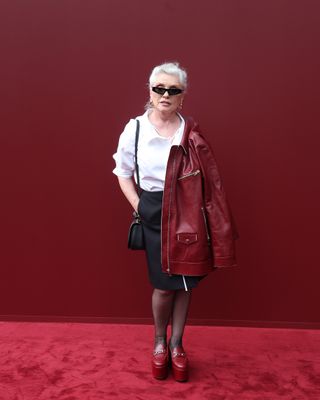 Debbie Harry attends the Gucci show