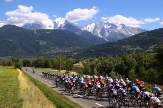 MEGEVE FRANCE JULY 12 A general view of the peloton passing through Mariloz Passy 563m during the 109th Tour de France 2022 Stage 10 a 1481km stage from Morzine to Megve 1435m TDF2022 WorldTour on July 12 2022 in Megeve France Photo by Michael SteeleGetty Images