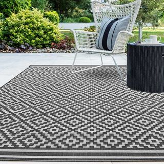 Decorating for a garden party with outdoor rugs