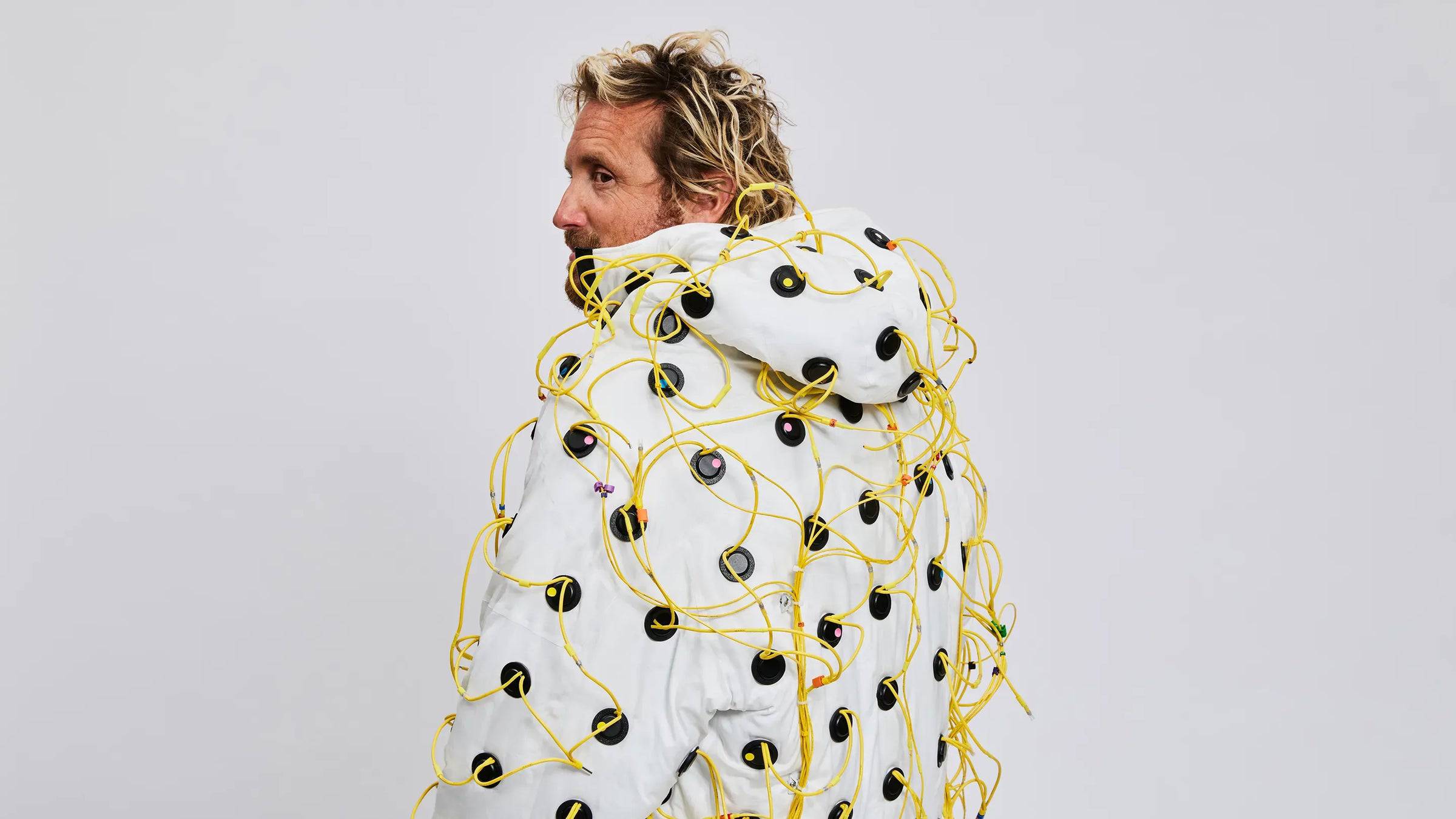 A man wearing the Vollebak Sonic Jacket.