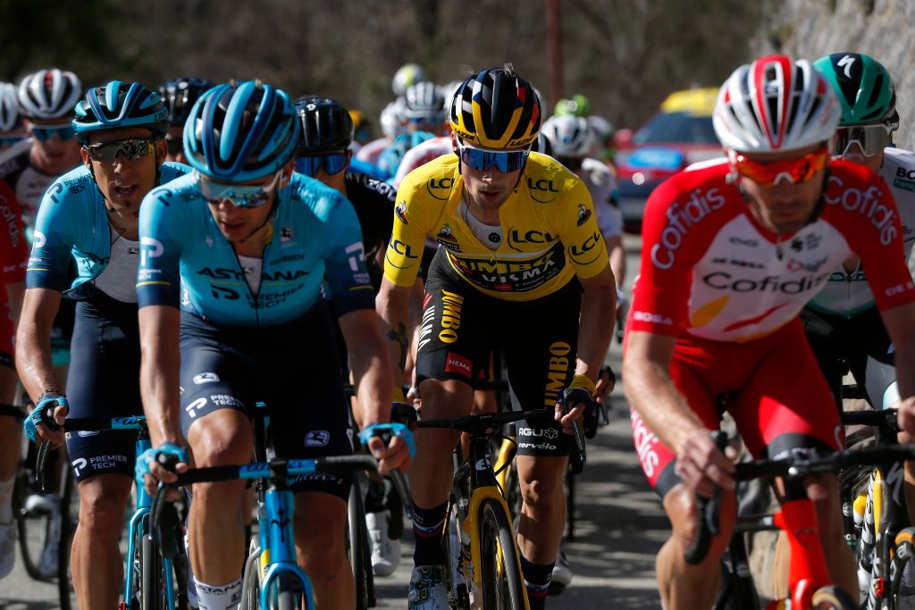 VALDEBLORE LA COLMIANE FRANCE MARCH 13 Omar Fraile Matarranz of Spain and Team Astana Premier Tech Primoz Roglic of Slovenia and Team Jumbo Visma Yellow leader jersey during the 79th Paris Nice 2021 Stage 7 a 119km stage from Le Broc to Valdeblore La Colmiane 1501m Stage itinerary redesigned due to COVID19 lockdown imposed in the city of Nice ParisNice on March 13 2021 in Valdeblore La Colmiane France Photo by Bas CzerwinskiGetty Images