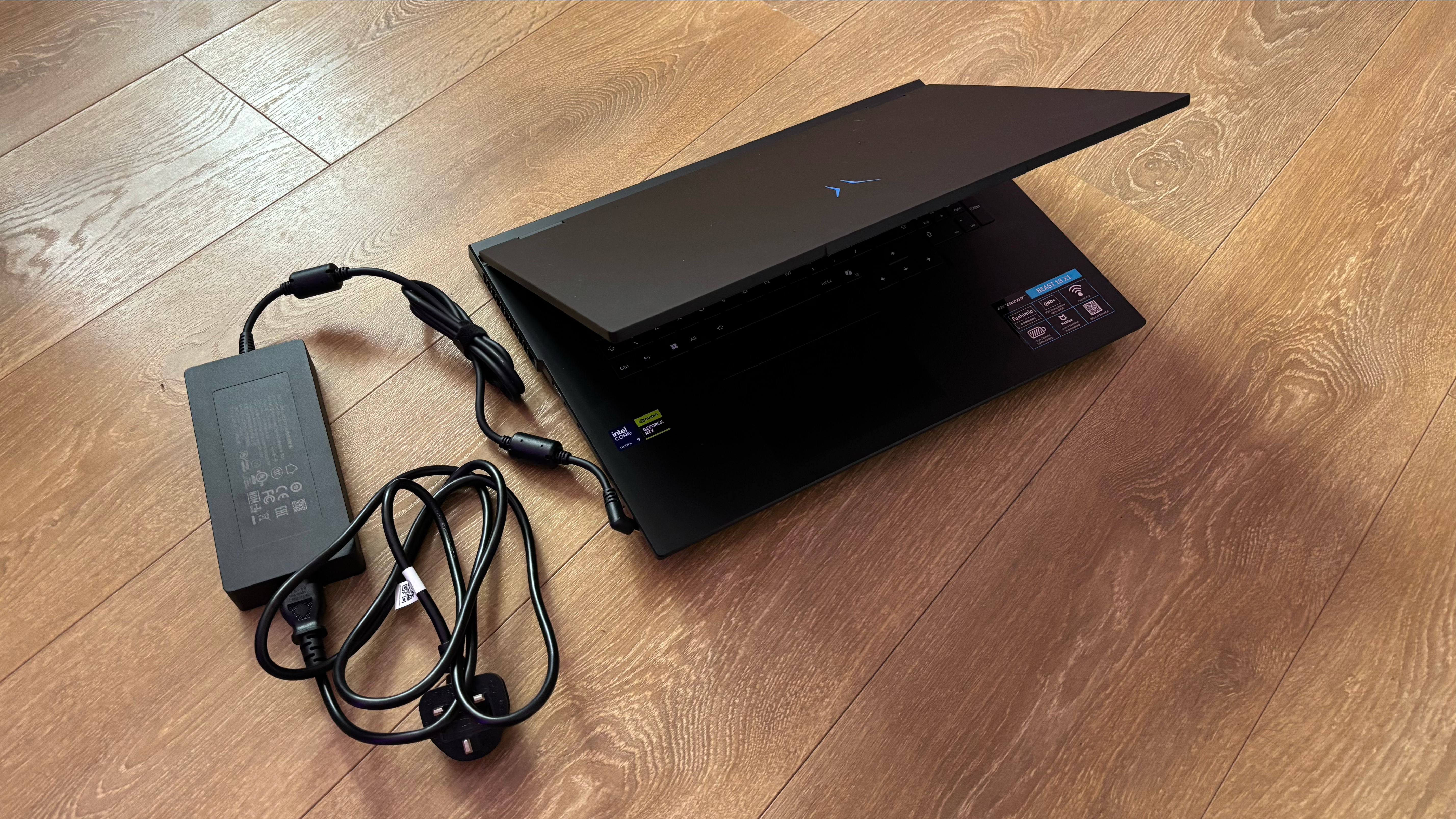 Medion Erazer Beast 18 gaming laptop on wooden floor