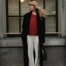 A photo of @anoukyve wearing a cozy textured outfit. 