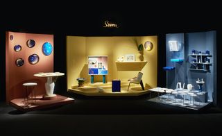 colourful stand design to showcase works by the like of Nendo
