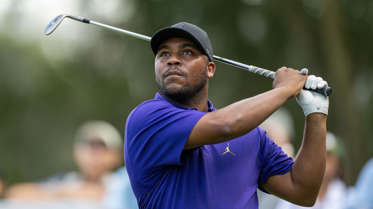 Harold Varner hits a wedge shot