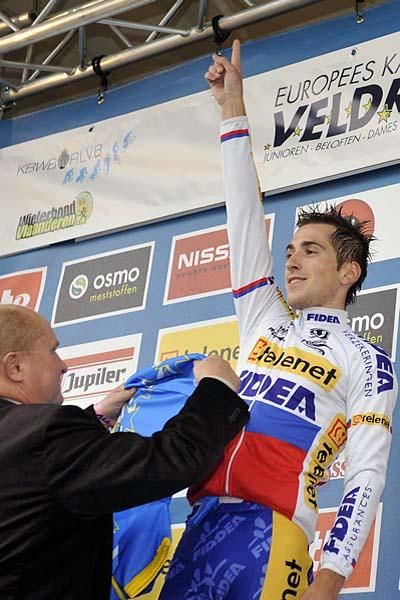 Under 23 winner Robert Gavenda celebrates on the podium.