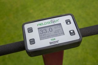 The screen on a moisture detection probe when entered into a putting surface