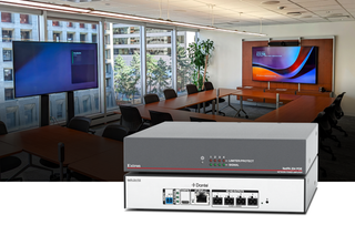 The Extron NetPA 204 POE Multi-Zone POE Amplifier with DSP and Dante in front of a conference room.