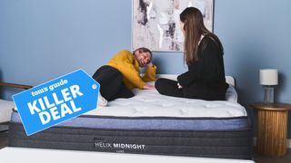 ShareShopping's Guide Sleep Features Editor and Staff Writer lay on the Helix Midnight Luxe during testing