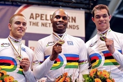 French team's riders Michael D'Almeida, Gregory Bauge and Kevin Sireau show their gold medal during the podium ceremony for the team sprint