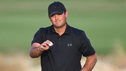 Patrick Reed celebrates winning the Qatar Masters