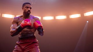 Adonis Creed prepares to box in the ring in Creed 3