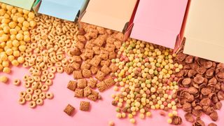 Boxes of cereals spilt on table