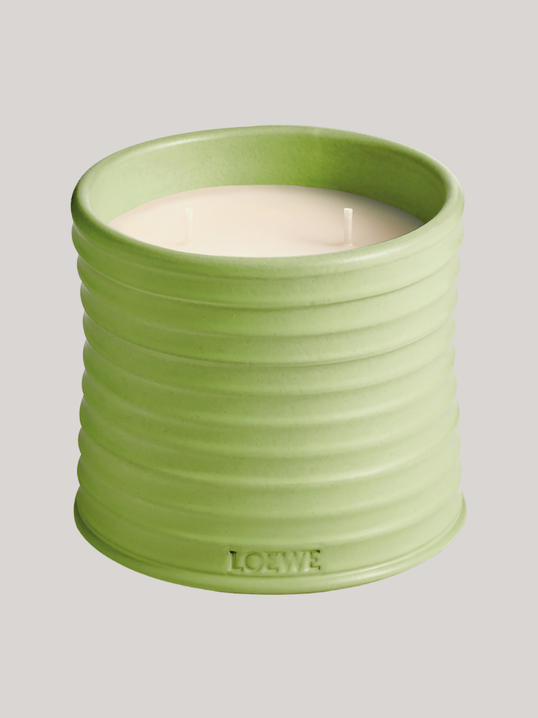 A green cucumber candle from Loewe