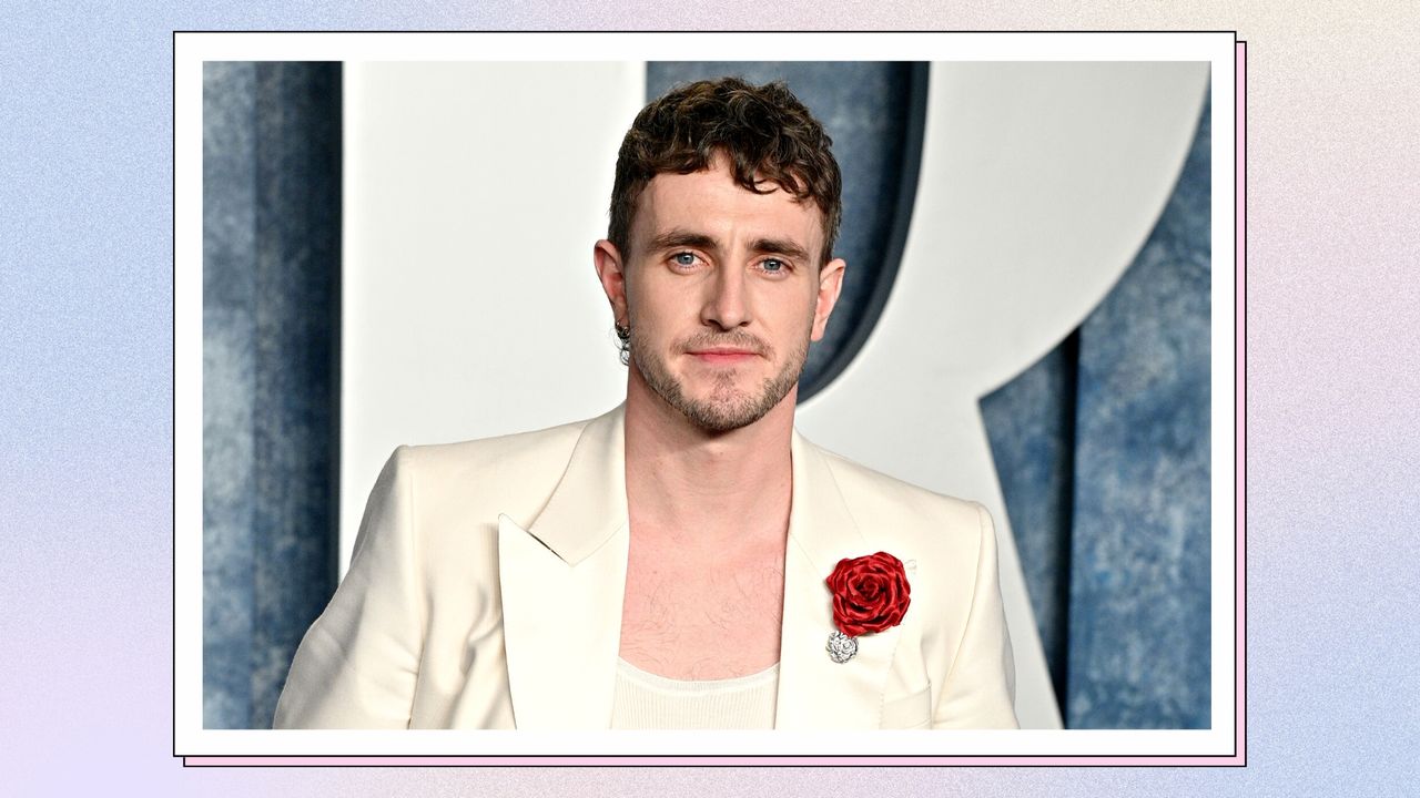 Paul Mescal wears a white suit with a red rose on the lapel, as he attends the 2023 Vanity Fair Oscar Party Hosted By Radhika Jones at Wallis Annenberg Center for the Performing Arts on March 12, 2023 in Beverly Hills, California/ in a blue, cream and purple gradient template