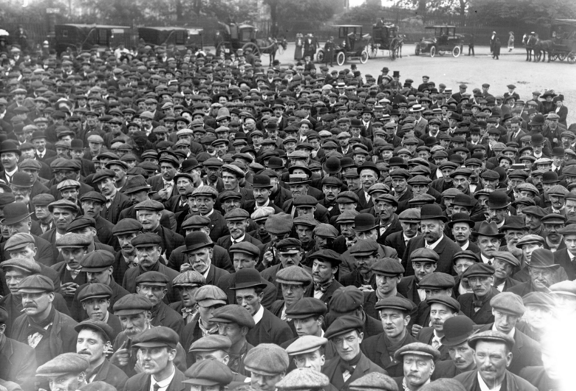 All hats, folks: A 1912 transport workers&#039; meeting shows every head covered by hat.