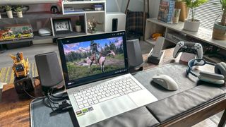 Asus ROG Zephyrus G14 (2024) with Red Dead Redemption 2 on the screen