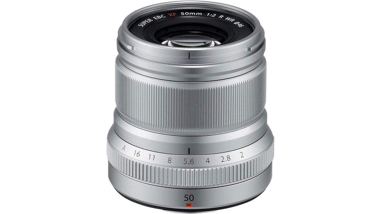 A silver Fujifilm XF 50mm f/2 R WR standing upright