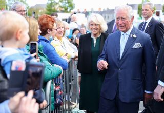 BANGOR, NORTHERN IRELAND - MAY 19: Prince Charles, Prince of Wales and Camilla, Duchess of Cornwall meet wellwishers as they visit Bangor open air market on May 19, 2021 in Bangor, Northern Ireland. (Photo by Chris Jackson - Pool/Getty Images)