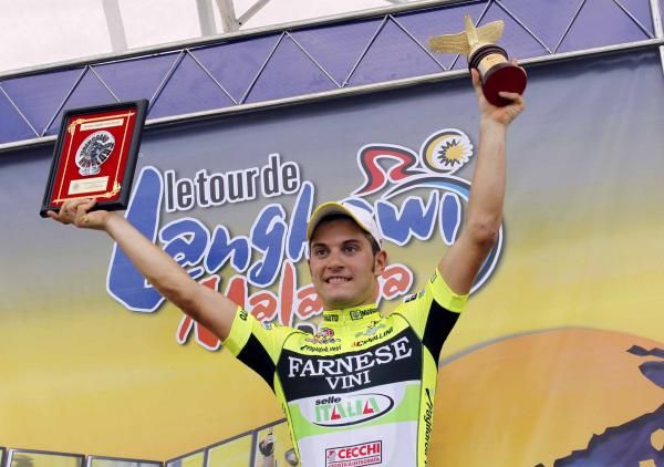 Andrea Guardini (Farnese Vini-Selle Italia) celebrates on the podium.