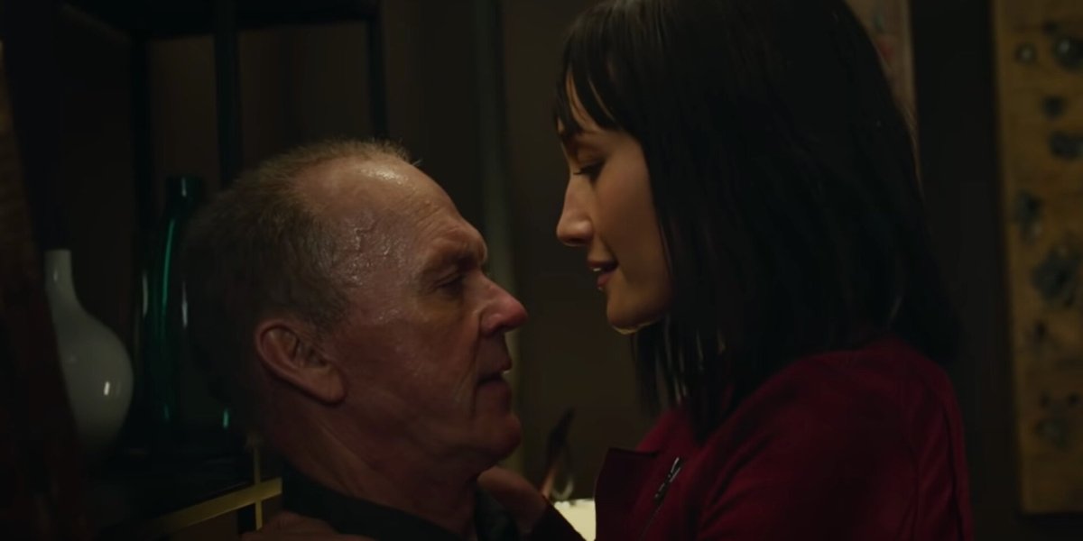 Michael Keaton and Maggie Q in The Protégé