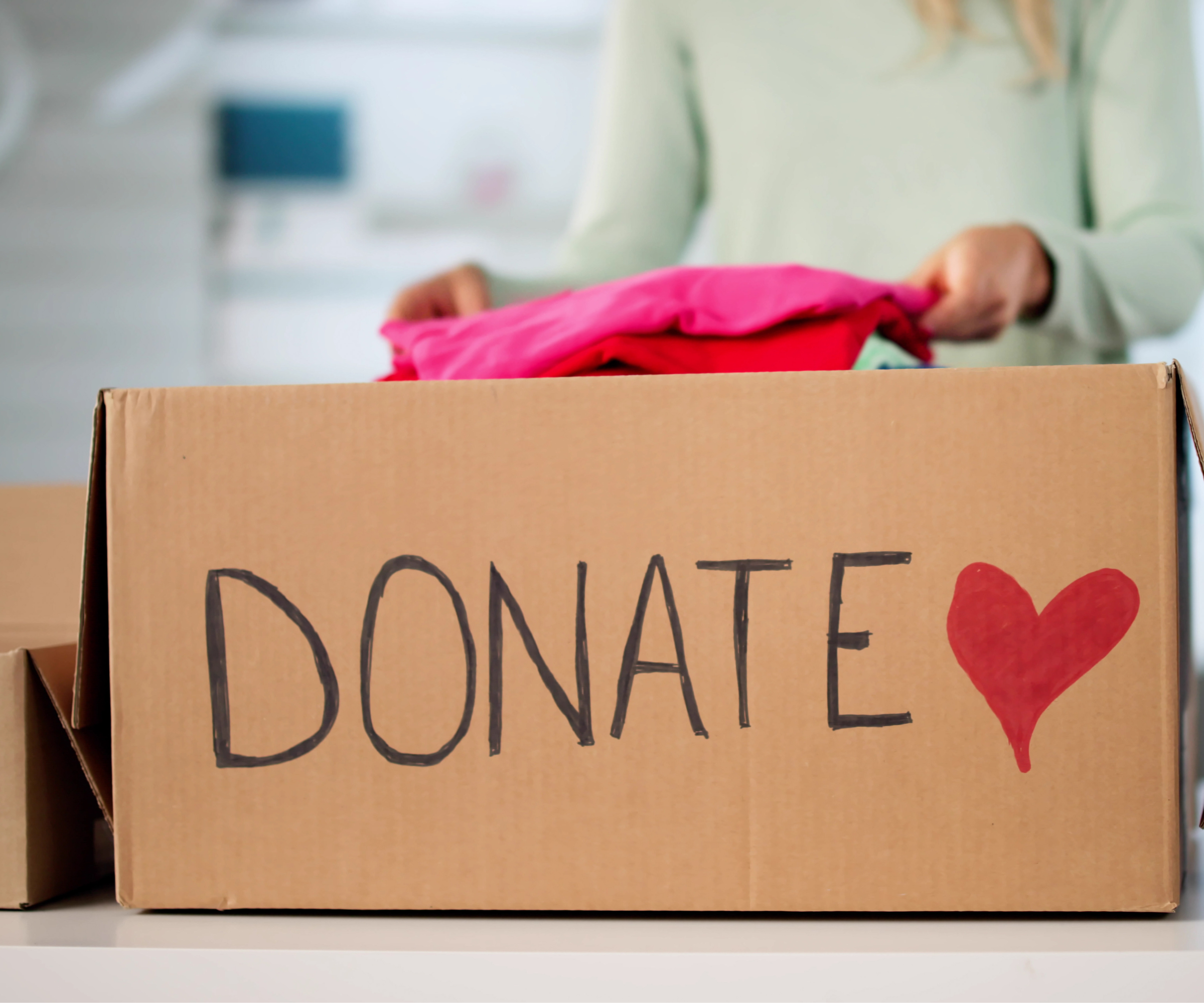 box with donate and a heart written on it