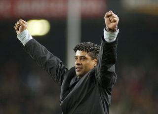 Frank Rijkaard celebrates a goal for Barcelona against Alaves in January 2006.