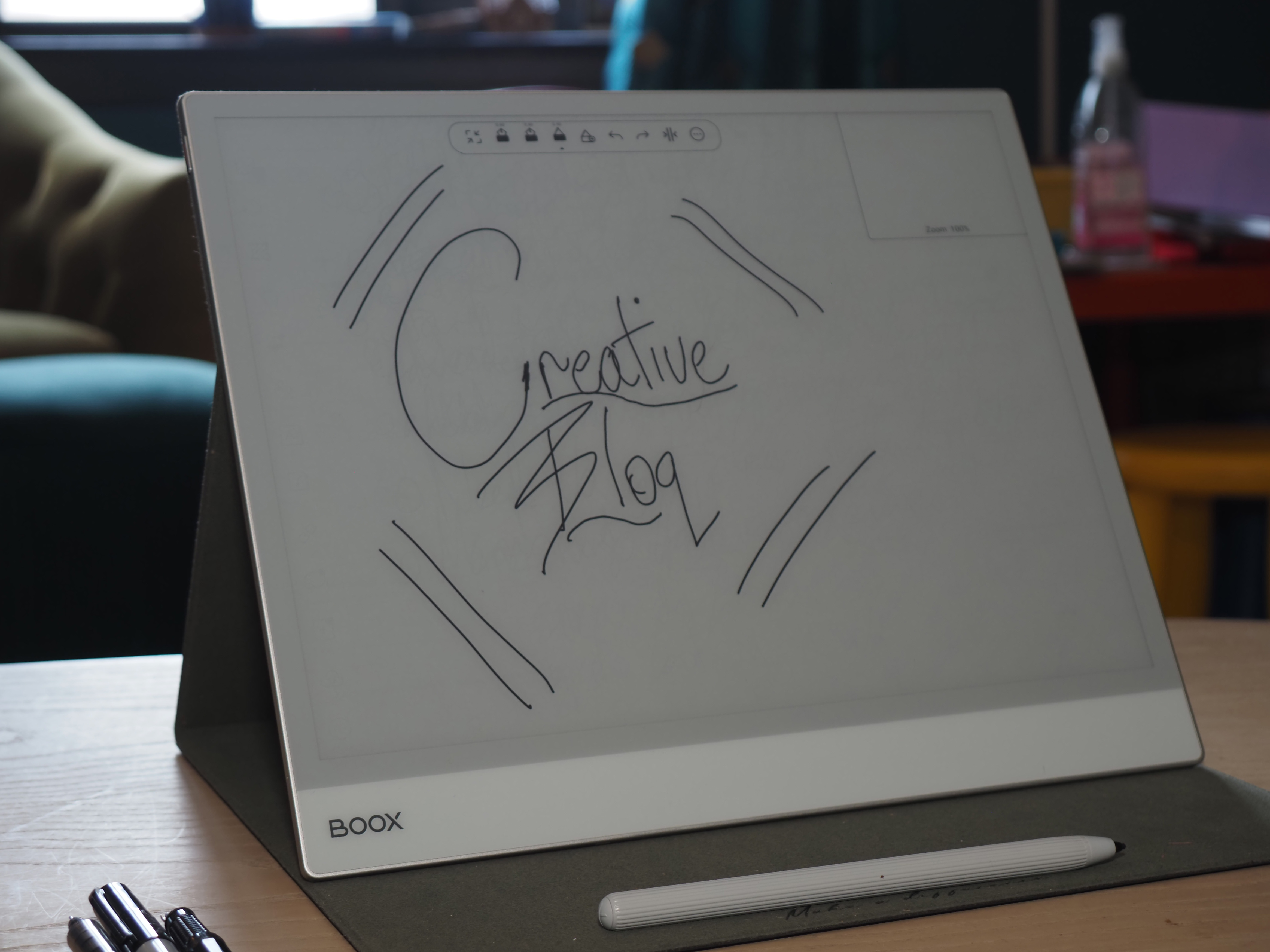 An Onyx Boox Note Max ereader on a desk