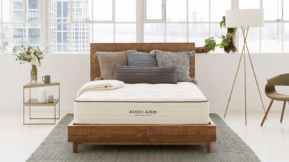Mattress sales from Avocado: an Avocado mattress in a bedroom with a city view.