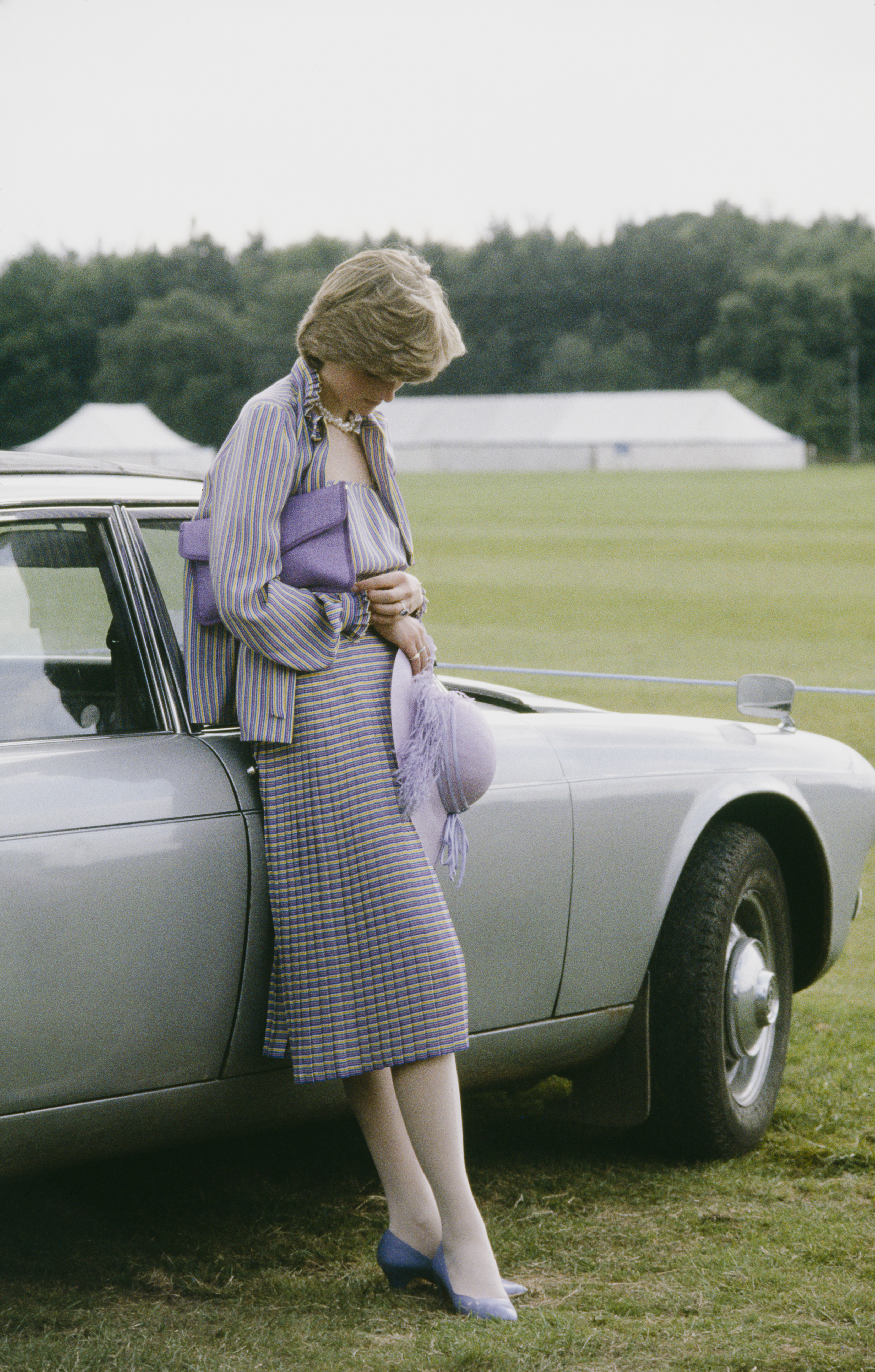 Lady Diana Spencer, soon to be Diana, Princess of Wales (1961 - 1997), looking pensive at a polo match in Windsor after the Ascot races, 16th June 1981.