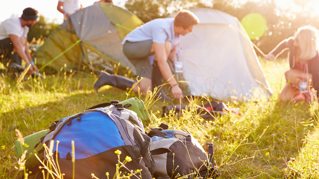 Man pitching tent