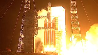 rocket launching from launch pad. 