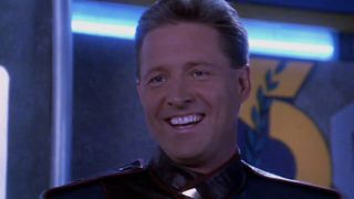 Bruce Boxleitner laughing in uniform in Babylon 5.