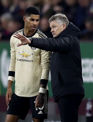 Solskjaer (right) says Rashford has his full support after recently being subjected to racial abuse