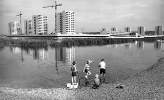 Children playing by the lake at Thamesmead, Greenwich, London, 1970s.