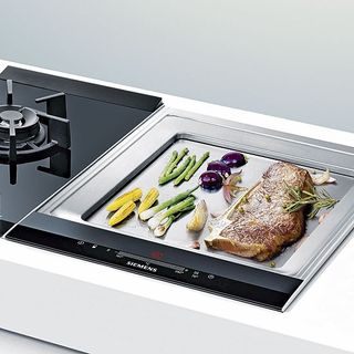 cooker with vegies and meat