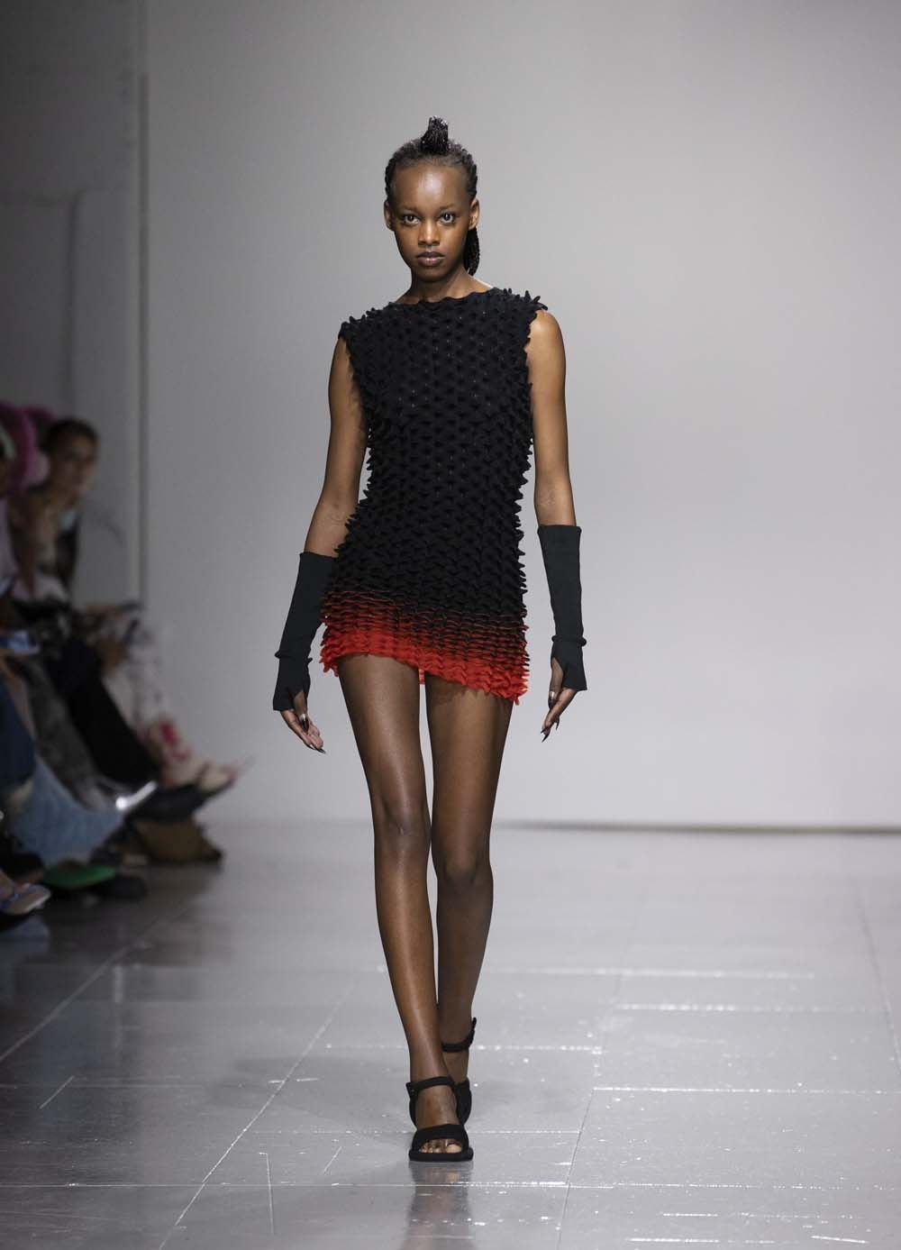 on the runway at London Fashion Week AW23