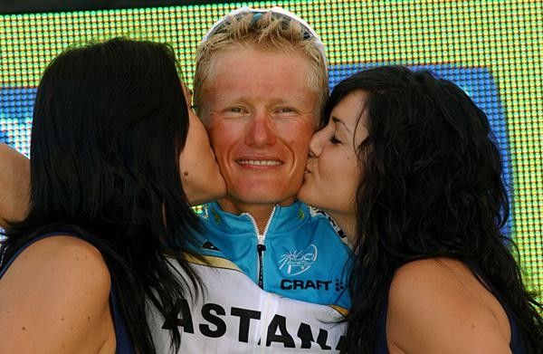 Alexandre Vinokourov (Astana) is kissed on the podium
