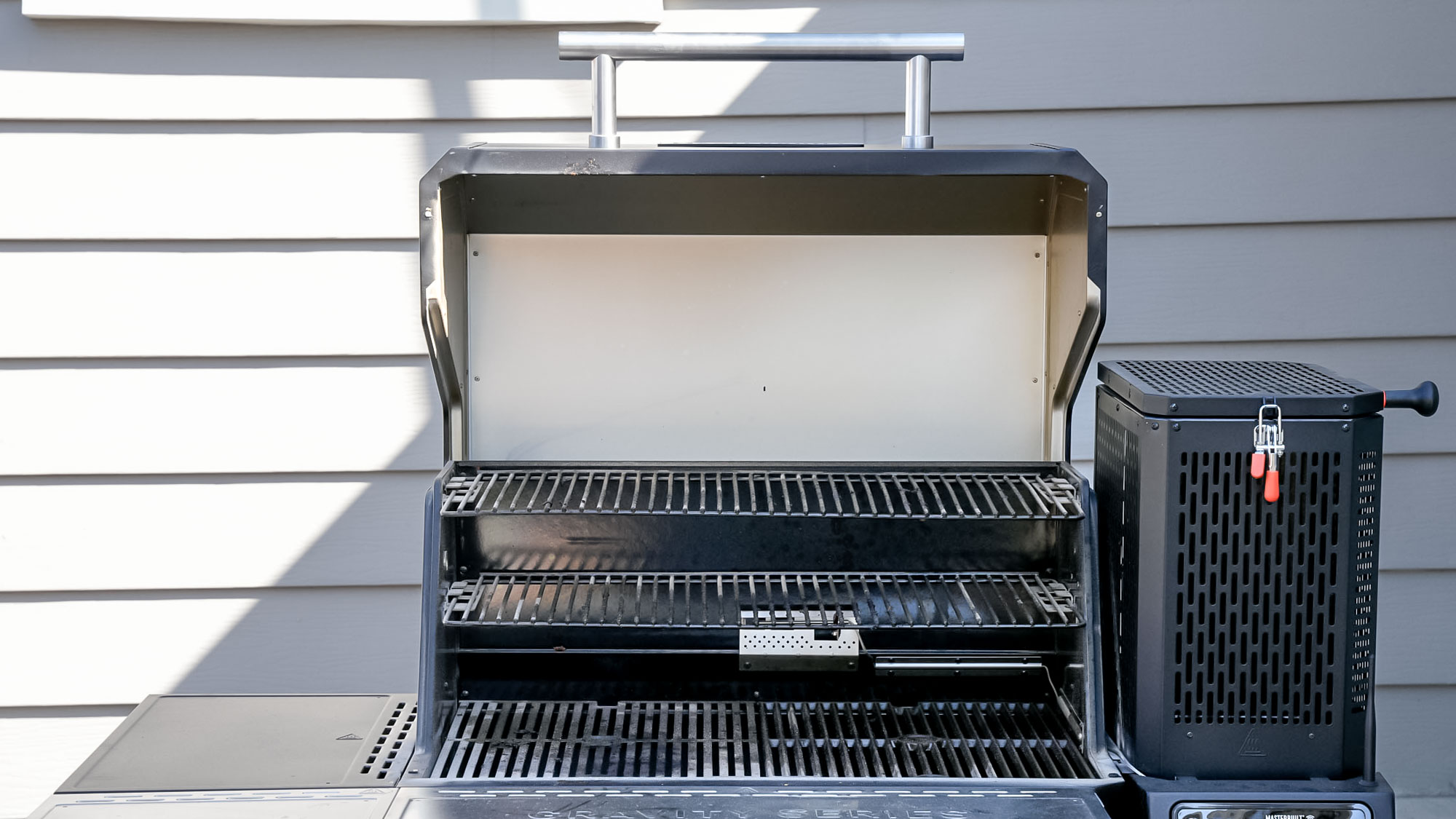 The Masterbuilt Gravity Series 1150 with the three level grill open