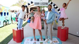 John Legend and Chrissy Teigen with their children