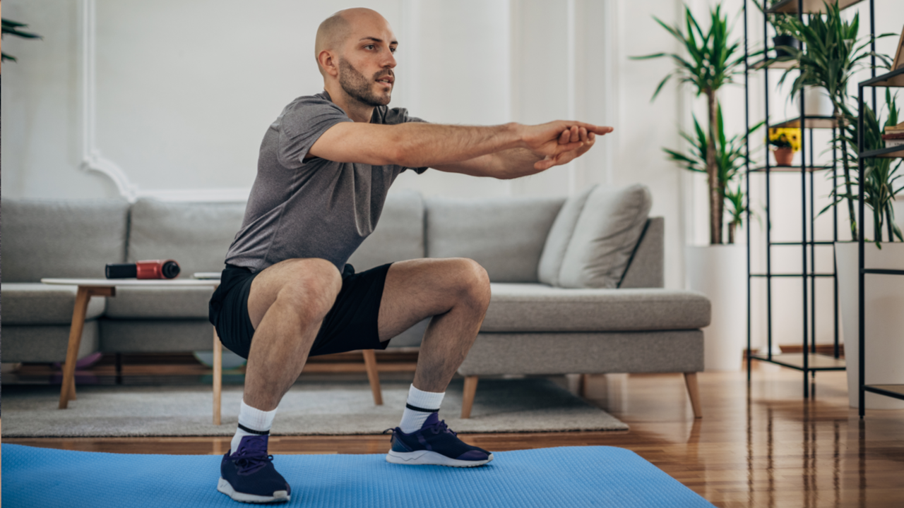 Man doing bodyweight squats