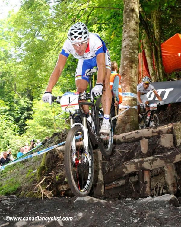Julien Absalon (Orbea) over a large drop.