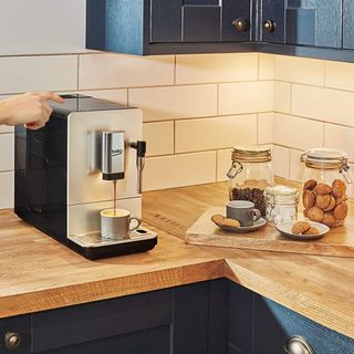 Beko CEG5311X Bean to Cup coffee machine on wooden counter top