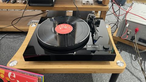 Dual CS 618Q turntable from front slight top-down angle with black vinyl record