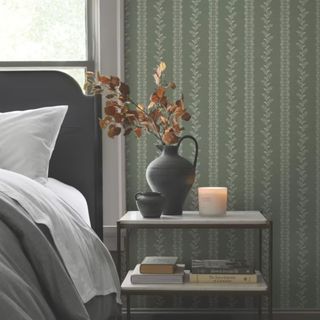 A room with floral wallpaper by Magnolia Home by Joanna Gaines