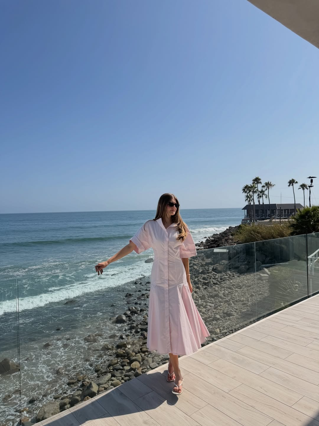 Sara Walker in a pink dress