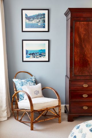 bedroom chair and tallboy in Victorian home with blue walls