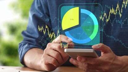 Pie chart and market price graphs overlaid on photo of man using smartphone.