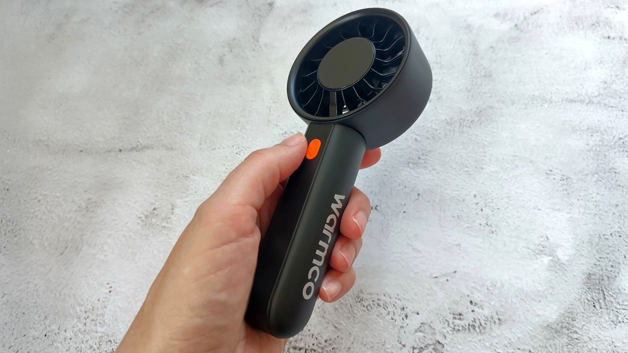 Warmco fan in reviewer's hand