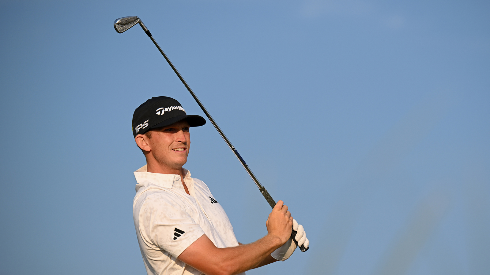Jacob Bridgeman hits a utility iron
